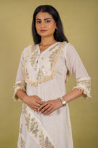 Off-white cotton dress with silver patti appliqué